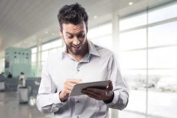 Joyful,Excited,Man,Receiving,Good,News,On,His,Tablet