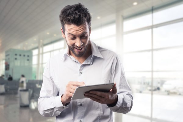 Joyful,Excited,Man,Receiving,Good,News,On,His,Tablet
